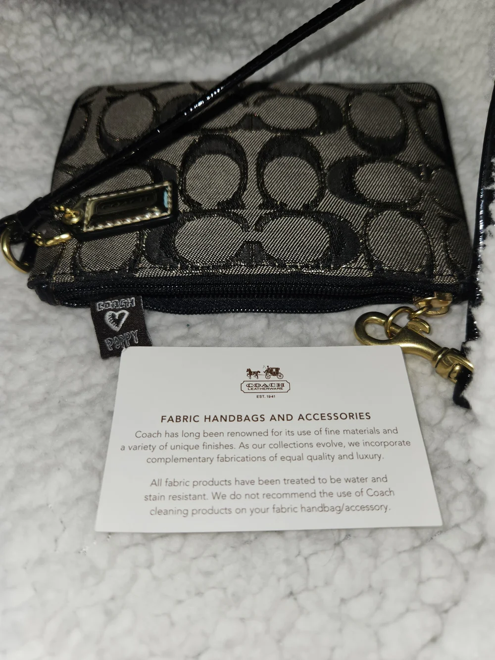 Coach Poppy Wristlet in Black and Gold Hardware